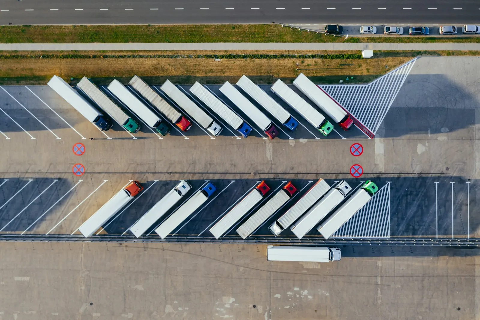Trailers backed onto loading docks, seen from above