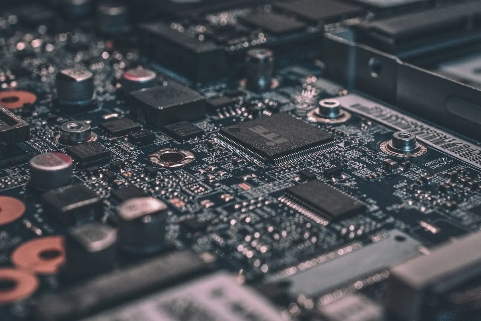 A printed circuit board photographed close, components in relief